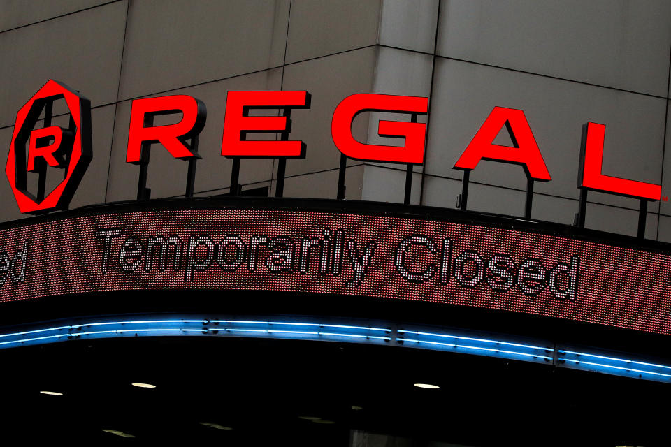 'Temporarily Closed' is displayed on the marquee of a Regal theatre during the outbreak of the coronavirus disease (COVID-19), in New York City, U.S., April 29, 2020. REUTERS/Brendan McDermid