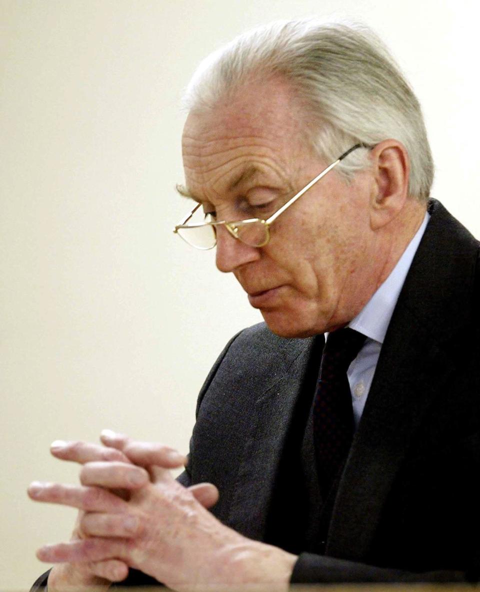 Lord Hutton announcing the results of his inquiry - KIERAN DOHERTY/Reuters