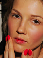 A model poses backstage at the Wes Gordon spring 2012 fashion show during Mercedes-Benz Fashion Week. 