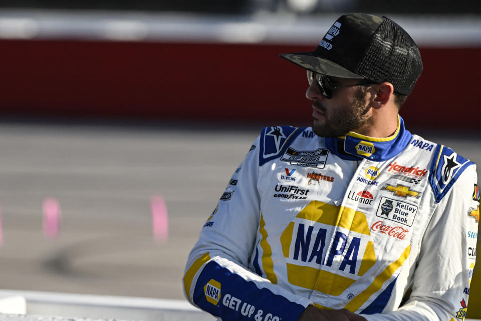 FILE - Chase Elliott looks on prior to a NASCAR Cup Series auto race at Darlington Raceway, Sunday, Sept. 3, 2023, in Darlington, S.C. Chase Elliott wants to race cars. Fast cars that he can drive to a second NASCAR championship. The rest of the stuff? The crowds, the commercials, the showcasing his every move on social media? That’s just never going to be part of the job that Elliott finds enjoyable. (AP Photo/Matt Kelley)