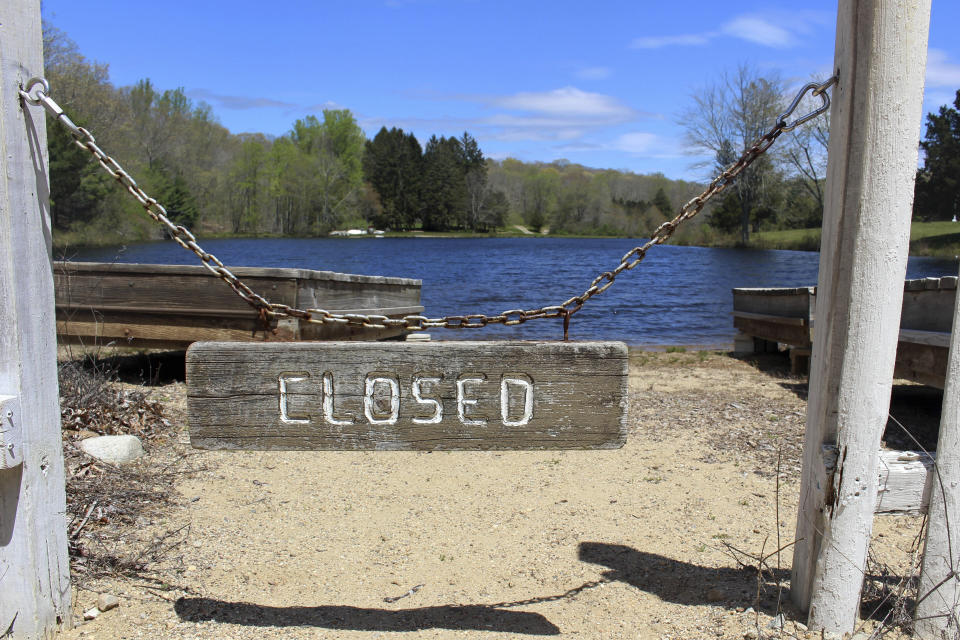 The Deer Lake Boy Scout Reservation in Killingworth, Conn., sits empty, Wednesday, May 11, 2022. The camp is among many nationwide being sold by local councils as membership dwindles and the organization raises money to pay sexual abuse victims as part of a bankruptcy settlement. Conservationists, government officials and others are scrambling to find ways to preserve them as open space. (AP Photo/Pat Eaton-Robb)