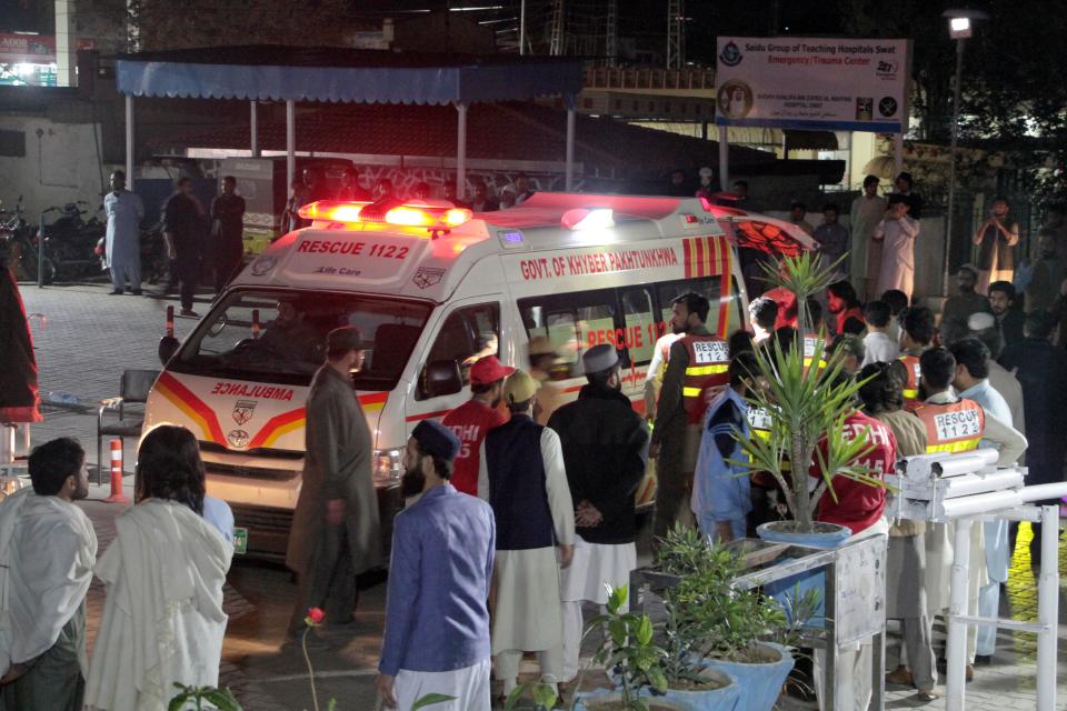 Rescue worker unload earthquake victims from an ambulance at a hospital in Saidu Sharif, a town Pakistan's Swat valley, Tuesday, March 21, 2023. A magnitude 6.5 earthquake rattled much of Pakistan and Afghanistan on Tuesday, sending panicked residents fleeing from homes and offices and frightening people even in remote villages. (AP Photo/Naveed Ali)