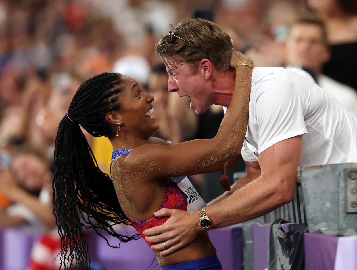 Tara DavisWoodhall and her husband, Hunter, gleefully celebrating her