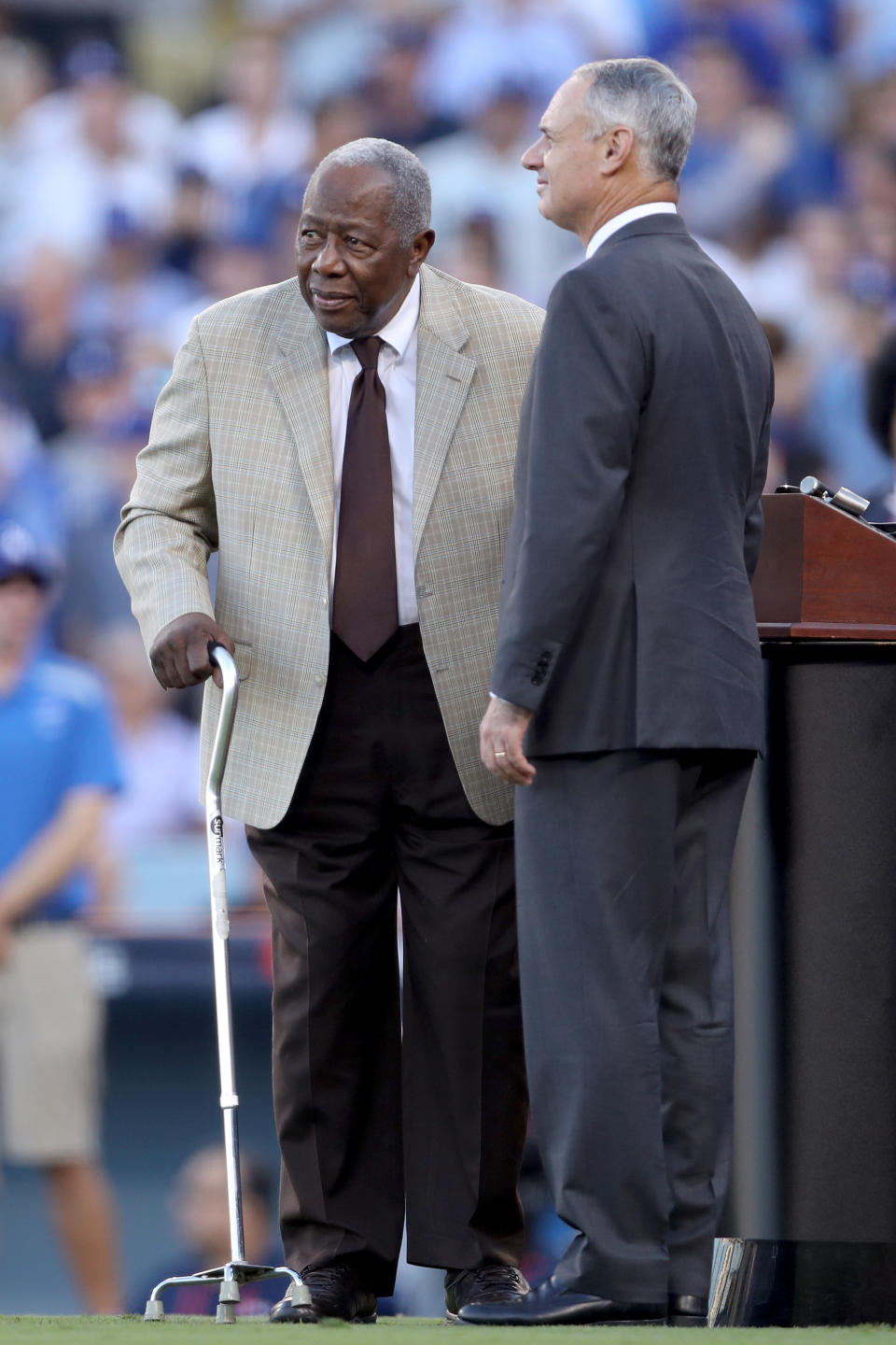 <p>Baseball Hall of Famer Hank Aaron stands with Major League Baseball Commissioner Robert D. Manfred Jr. before game two of the 2017 World Series between the Houston Astros and the Los Angeles Dodgers at Dodger Stadium on October 25, 2017 in Los Angeles, California. (Photo by Christian Petersen/Getty Images) </p>