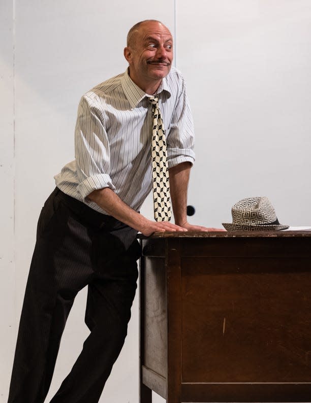 David Fraioli leans as he thinks in "Bread & Butter" at Wellfleet Harbor Actors Theatre.