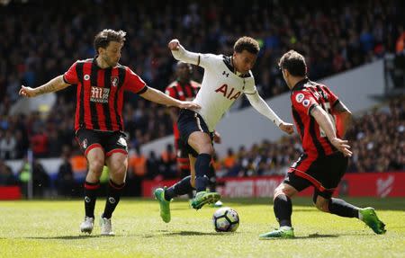 Britain Soccer Football - Tottenham Hotspur v AFC Bournemouth - Premier League - White Hart Lane - 15/4/17 Tottenham's Dele Alli in action with Bournemouth's Adam Smith and Harry Arter Action Images via Reuters / Paul Childs Livepic