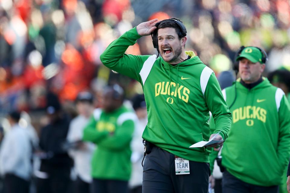 Oregon head coach Dan Lanning calls to players during the first half of the Nov. 26 game against Oregon State.