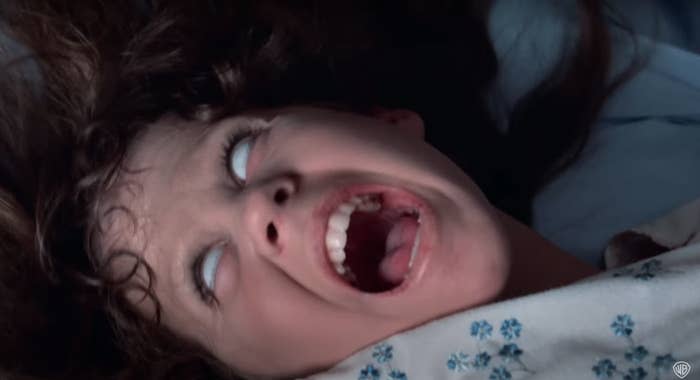 Reagan from "The Exorcist" in the throes of possession, with her eyes rolled back