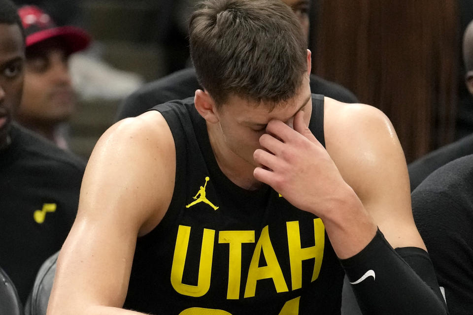 Utah Jazz's Walker Kessler sits on the bench during during the closing minutes of an NBA basketball game against the Chicago Bulls on Monday, Nov. 6, 2023, in Chicago. The Bulls won 130-113. (AP Photo/Charles Rex Arbogast)