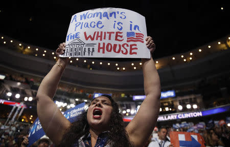 California delegate Bobbie Singh-Allen cheers with a sign. REUTERS/Jim Young