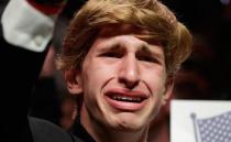 Jonathan Pozzie cheers for Republican presidential candidate Donald Trump during a campaign rally. Photo: AAP