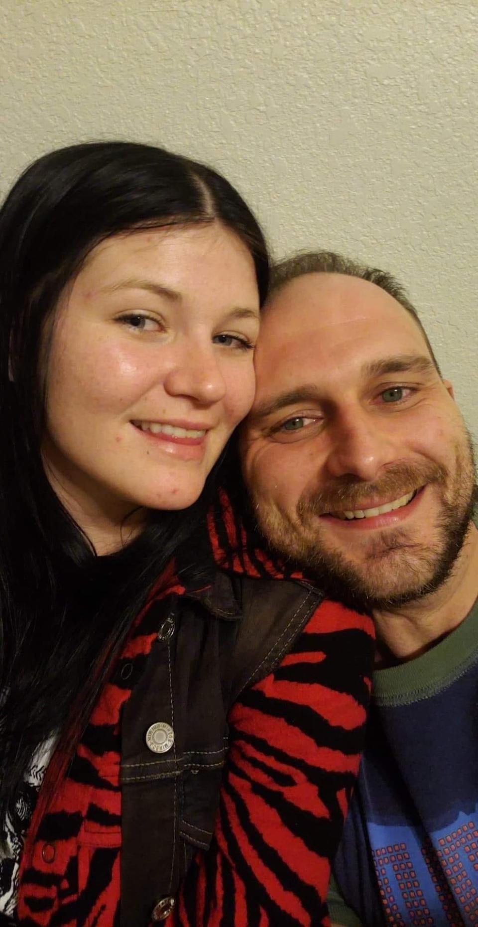 Joshua McLemore is pictured with his girlfriend, Abigail Smith. McLemore, 29, died of multiple organ failure after he was kept in an isolation cell at Jackson County Jail in Brownstown, Indiana for 20 days, according to a federal lawsuit alleging violation of his constitutional rights.