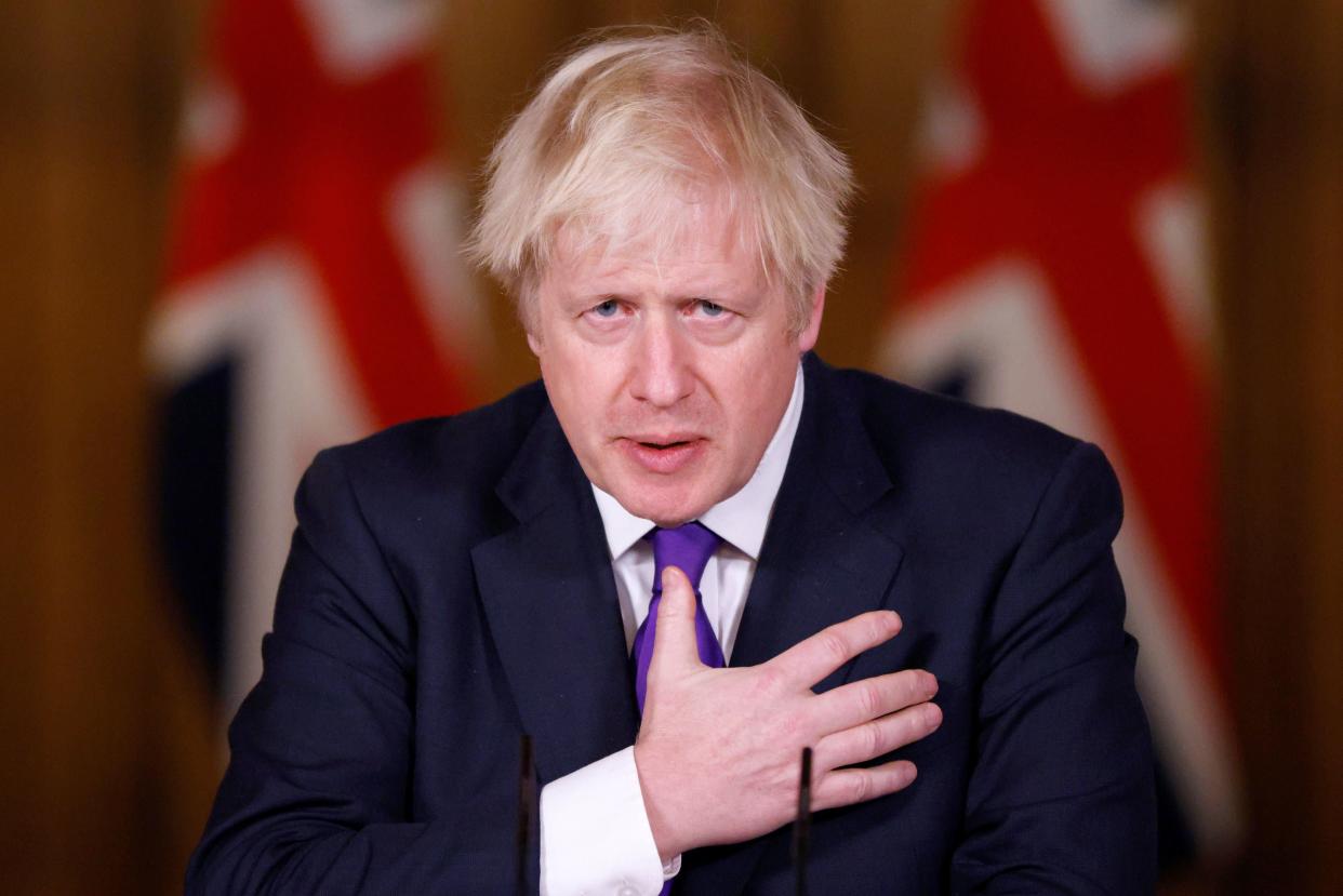 <p>Boris Johnson addresses the Downing Street press conference</p> (PA)