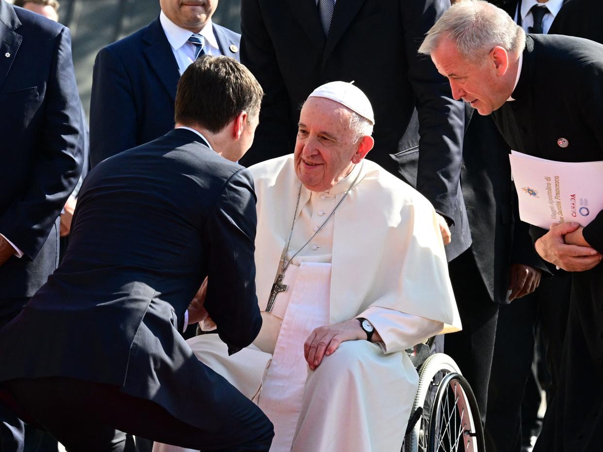 Canadian Prime Minister Justin Trudeau (L) greets Pope Francis as he arrives at the Citadelle de Québec in Quebec City, Quebec, Canada, on July 27, 2022.