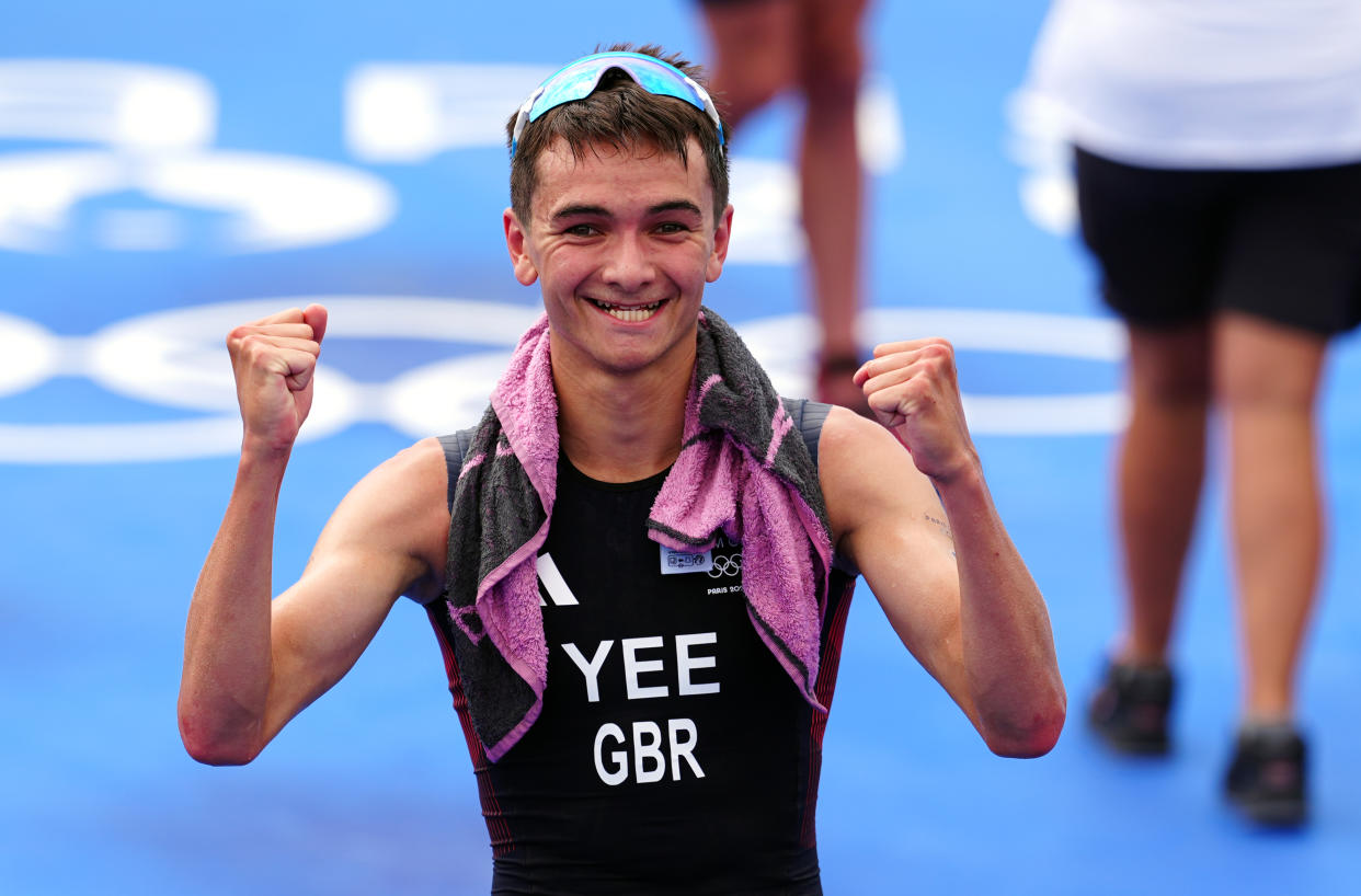 Great Britain's Alex Yee celebrates winning a gold medal following the Men's Individual Triathlon at the Pont Alexandre III on the fifth day of the 2024 Paris Olympic Games in France. Picture date: Wednesday July 31, 2024. (Photo by David Davies/PA Images via Getty Images)