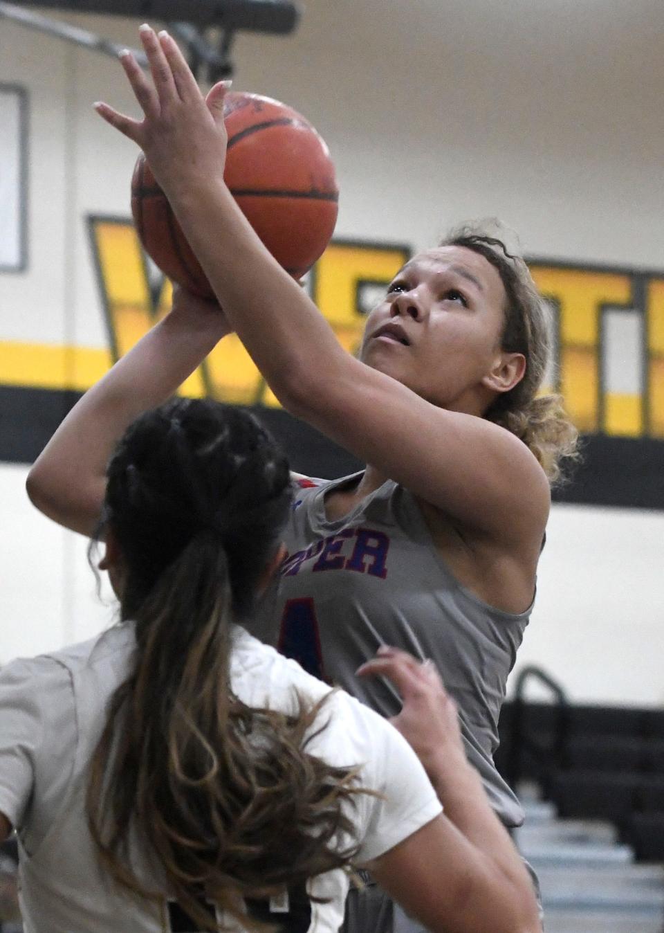 Abilene Cooper's Ashlynn French goes for a layup against Lubbock High on Tuesday at Westerner Arena.