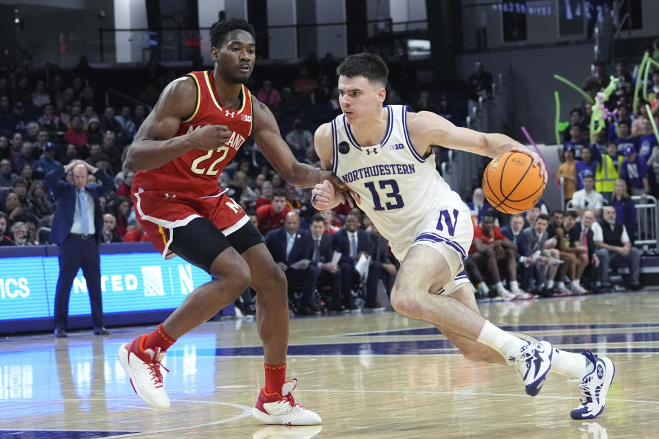 Northwestern guard Brooks Barnhizer, right, drives as Maryland forward Jordan Geronimo defends during the second half of an NCAA college basketball game in Evanston, Ill., Wednesday, Jan. 17, 2024. (AP Photo/Nam Y. Huh)