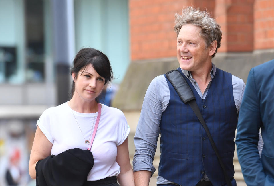 Emmerdale actor Mark Jordon and his partner Laura Norton at Manchester Minshull Street Crown Court, where he is charged with assault on a pensioner. (Photo by Jacob King/PA Images via Getty Images)