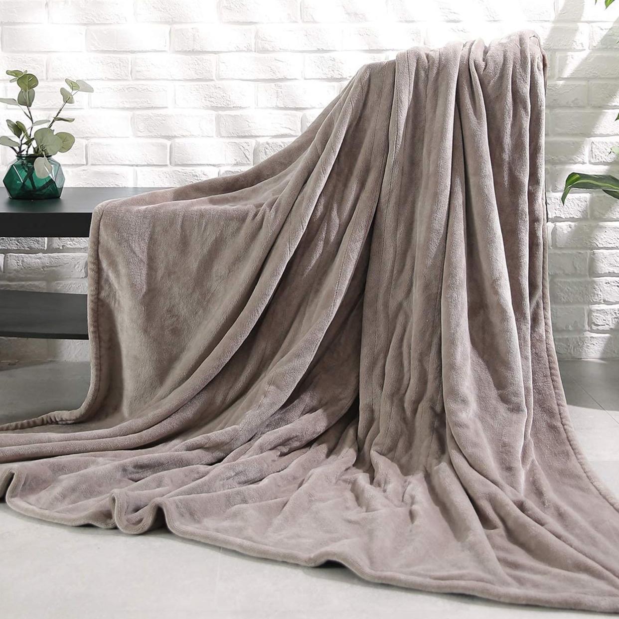 <p><a href="https://go.redirectingat.com?id=74968X1596630&url=https%3A%2F%2Fwww.walmart.com%2Fip%2FMARNUR-Electric-Blanket-72-x-84-Full-Size-Heated-Blanket-Fast-Heating-4-Heating-Levels-10H-Auto-off-Machine-Washable-Linen%2F515400669&sref=https%3A%2F%2F" rel="nofollow noopener" target="_blank" data-ylk="slk:Shop Now;elm:context_link;itc:0;sec:content-canvas" class="link rapid-noclick-resp">Shop Now</a></p><p>Machine-Washable Electric Blanket</p><p>walmart.com</p><p>$52.99</p>