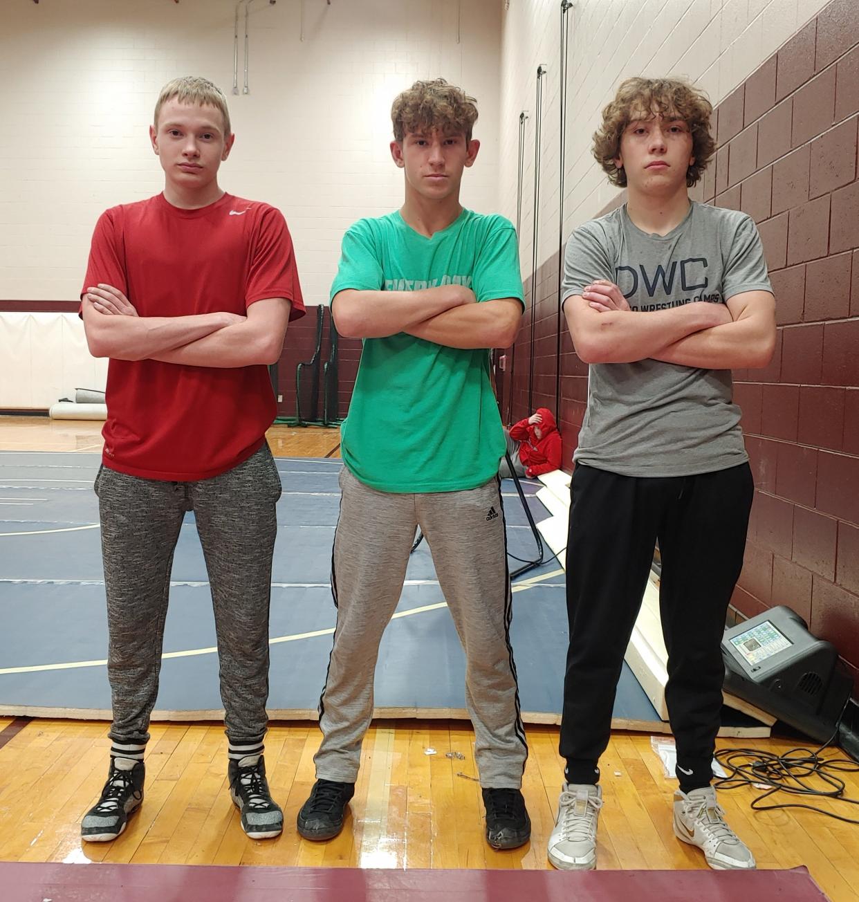 Canal Winchester wrestlers, from left, Chance Newsome, Bobby Davies and Micah Dollery have anchored the lightweight portion of the Indians' lineup this season. The trio combined for 49 wins before Jan. 20. Davies is the team's only returning Division I district qualifier.