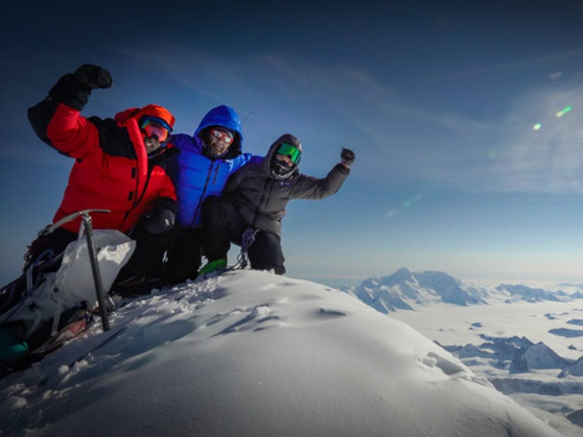 Justin Wallace, Ryan Agar and John Bestfather at the summit of Mount Logan on May 18, 2021.  (Submitted by John Bestfather - image credit)