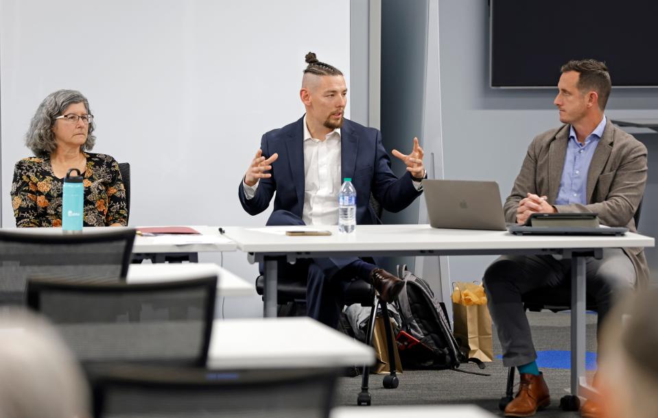 Cynthia Rogers, left, Brandli Stitzel and Travis Roach speak Dec. 5 during a panel discussion about the economic impact of a new Oklahoma City arena.