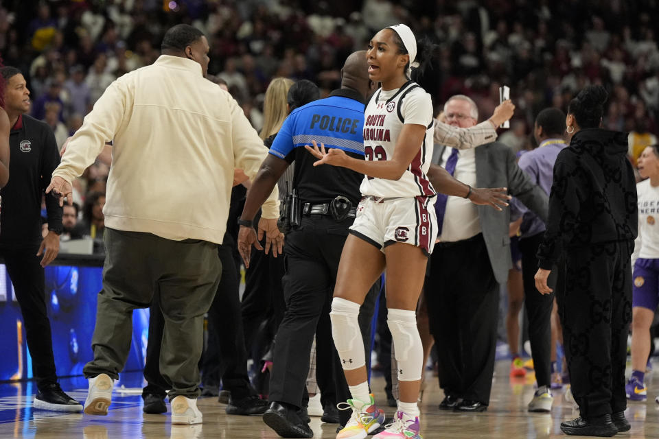 South Carolina guard Bree Hall reacts during a player altercation during the second half of an NCAA college basketball game against LSU at the Southeastern Conference women's tournament final Sunday, March 10, 2024, in Greenville, S.C. (AP Photo/Chris Carlson)