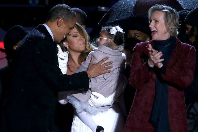 <p>Alex Wong/Getty </p> Mariah Carey and Monroe meet with Barack Obama in 2013