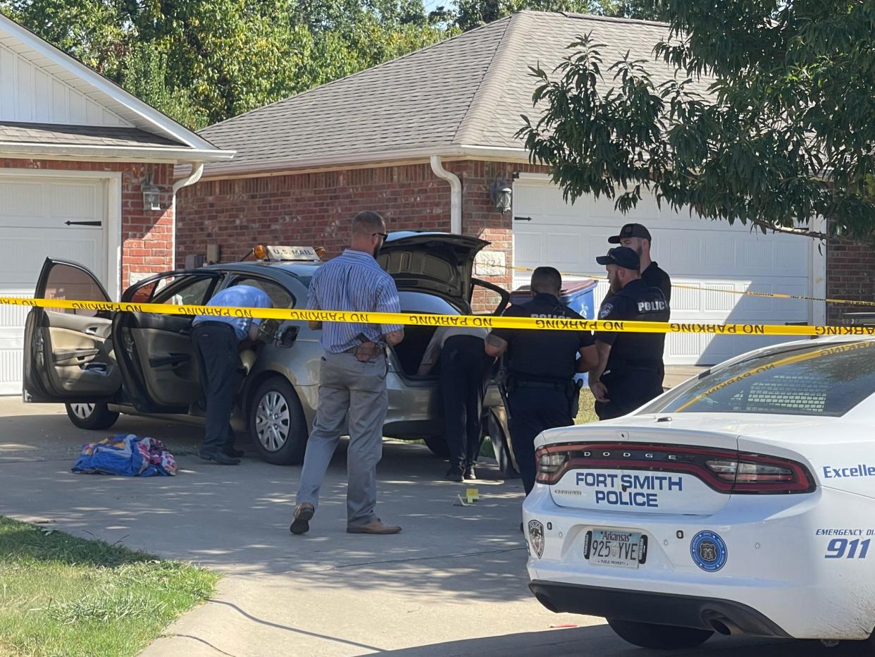 Fort Smith police investigate the death of a child who was found in a car on Tuesday, Aug. 16, 2022.