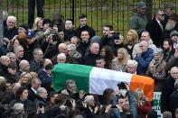 Pallbearers make their way in the funeral procession of former Northern Ireland Deputy First Minister Martin McGuinness in Derry, Northern Ireland on March 23, 2017