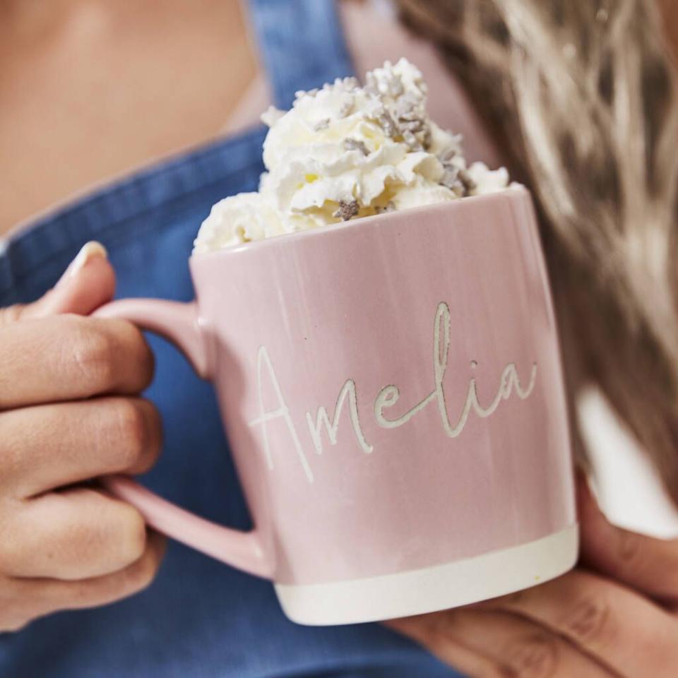 <p>A beautiful stoneware mug personalised with your name. </p><p><strong>Not On The High Street</strong>, <strong>£20.00</strong></p><p><a class="link " href="https://go.redirectingat.com?id=127X1599956&url=https%3A%2F%2Fwww.notonthehighstreet.com%2Fsophiavictoriajoy%2Fproduct%2Fpersonalised-pink-stoneware-mug&sref=https%3A%2F%2Fwww.delish.com%2Fuk%2Fkitchen-accessories%2Fg29229984%2Fpersonalised-mugs%2F" rel="nofollow noopener" target="_blank" data-ylk="slk:BUY NOW;elm:context_link;itc:0;sec:content-canvas">BUY NOW</a> </p>