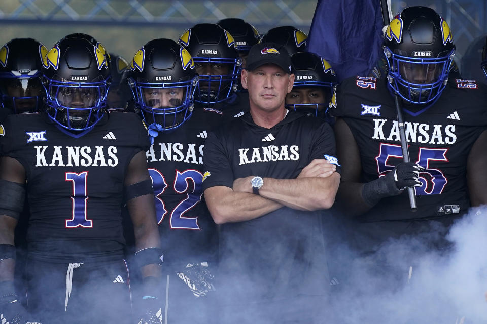 Kansas head coach Lance Leipold waits with his players to run onto the field before an NCAA college football game against Illinois Friday, Sept. 8, 2023, in Lawrence, Kan. (AP Photo/Charlie Riedel)