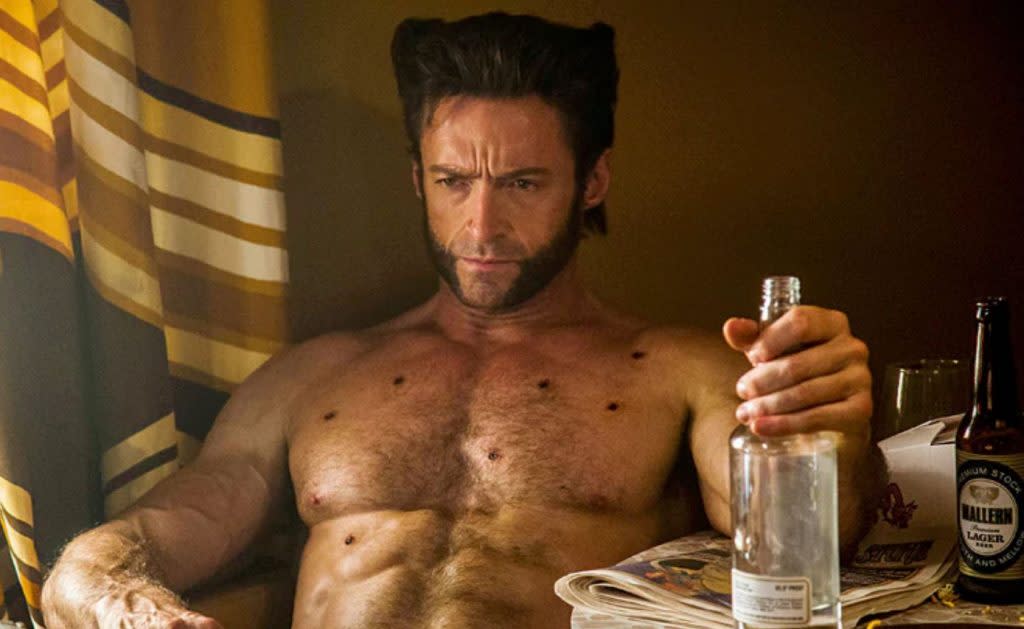 Hugh Jackman drinking as Wolverine.