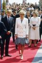 <p>Diana wore an oversized white blazer paired with a striped dress by Catherine Walker while walking the red carpet at the Cannes Film Festival on May 15, 1987.</p>