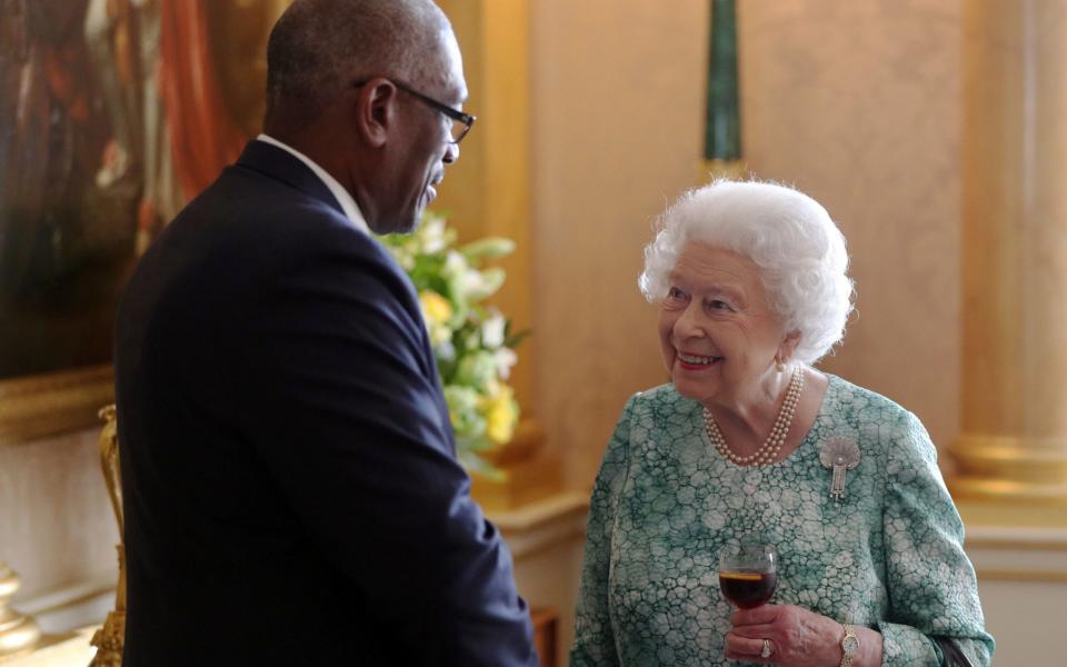 The Queen receives the Prime Minister of the Bahamas, Hubert Minnis, during a lunchtime reception - PA