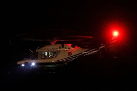 A Royal Thai Police helicopter carrying rescued schoolboys takes off near Tham Luang cave complex in the northern province of Chiang Rai, Thailand, July 8, 2018. REUTERS/Tyrone Siu