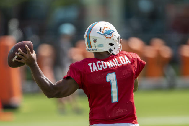 Los Angeles, United States. 10th Sep, 2023. Miami Dolphins quarterback Tua  Tagovailoa (C) runs with the ball fighting off pressure from the Los  Angeles Chargers during an NFL football game. Miami Dolphins