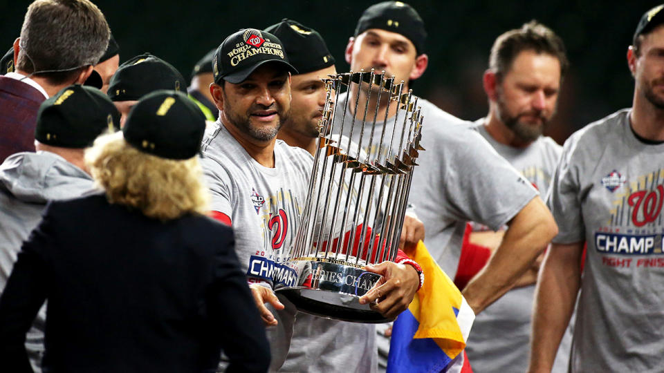 The Washington Nationals, pictured celebrating with the World Series trophy.