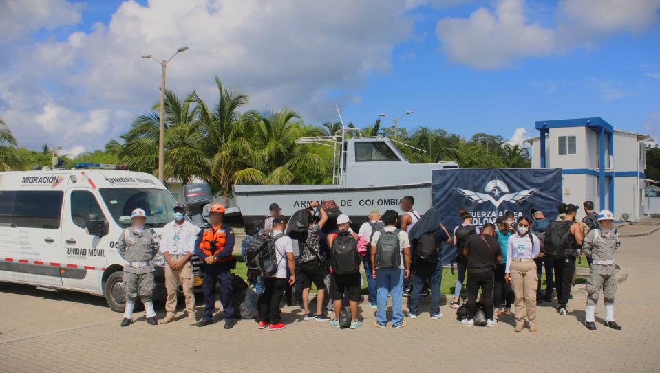 In this handout photo, the Colombian navy is pictured with 31 migrants rescued from the hands of smugglers on San Andres Island in the Caribbean in 2023.