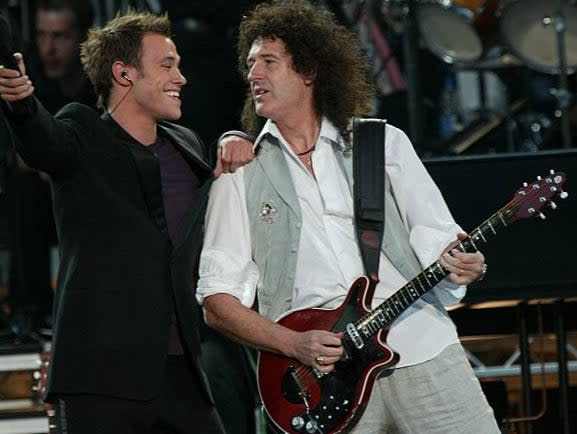 Will Young and Brian May perform at the palace for the golden jubilee in June 2002 (AFP via Getty Images)