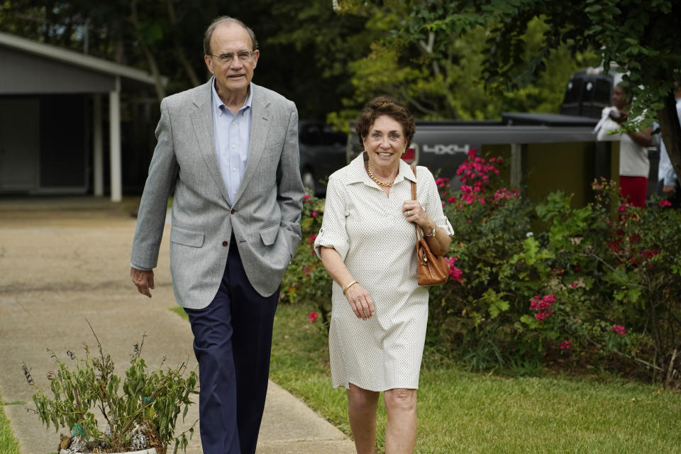 Republican Lt. Gov. Delbert Hosemann, left, and his wife Lynn Hosemann arrive at Spann Elementary School to vote in the party primary at their Jackson, Miss., precinct, Tuesday, Aug. 8, 2023. Hosemann who is seeking reelection, faces two opponents in the party primary. (AP Photo/Rogelio V. Solis)