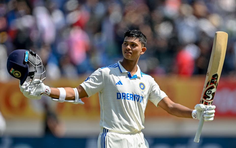 India's Yashasvi Jaiswal celebrates after scoring a double century (200 runs) during the fourth day of the third Test cricket match between India and England at the Niranjan Shah Stadium in Rajkot on February 18, 2024