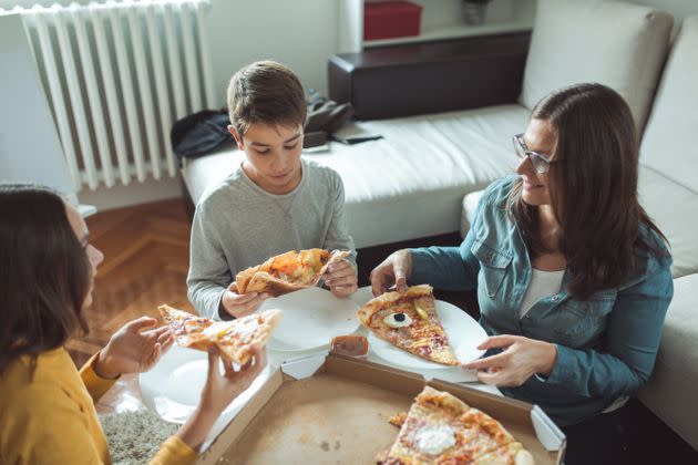 Meeting for the first time? Keep it casual. Think: The new Marvel movie on Disney+ and pizza at home where you get a chance to talk and get to know each other. (Photo: mixetto via Getty Images)