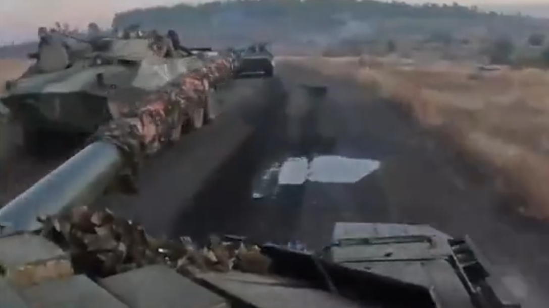 a group of tanks on a road