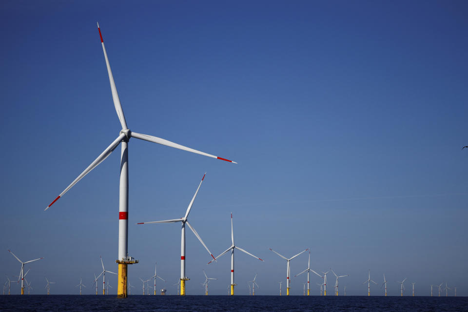 FILE - Wind turbines work at the Saint-Nazaire offshore wind farm, off the coast of the Guerande peninsula in western France, on Sept. 22, 2022. The wind power industry on Monday, March 27, 2023, projected growth to rapidly accelerate this year, with incentives and policy changes in key nations helping to overcome factors that led to a slowdown in 2022. (Stephane Mahe/Pool Photo via AP, File)