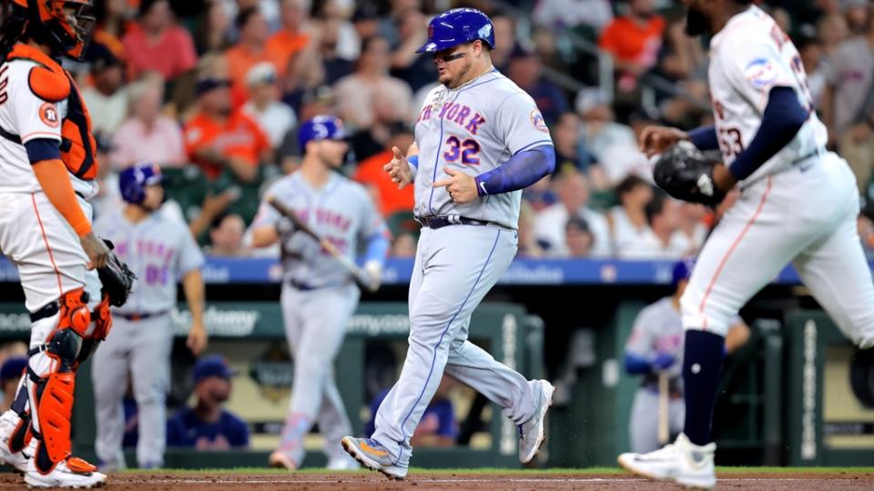 Jun 21, 2023; Houston, Texas, USA; New York Mets designated hitter Daniel Vogelbach (32) crosses home plate to score a run against the Houston Astros during the second inning at Minute Maid Park