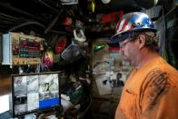 In U.S. coal country, workers forgive Trump for failed revival