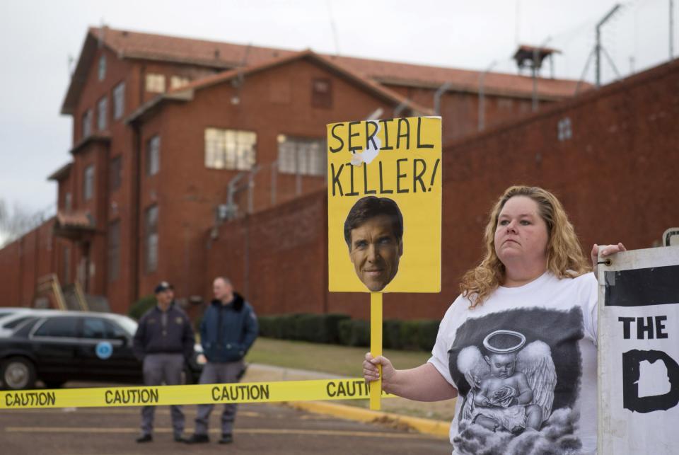 Allen protests outside the "Walls" prison unit where Edgar Tamayo is scheduled to be executed in Huntsville