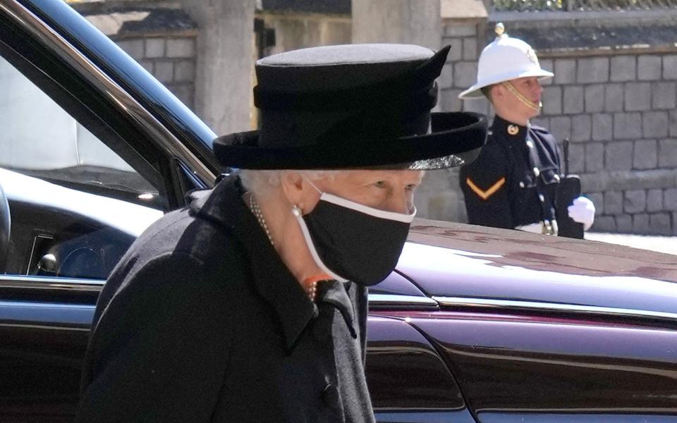 The Queen had to sit alone during the funeral due to social distancing regulations - Jonathan Brady/Pool via REUTERS