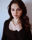 <p>Selena Gomez's stylist Kate Young shared three unseen pictures of the singer, actor and make-up mogul on her Instagram. In this picture the 28-year-old is wearing her deep brunette hair in bouncy curls, with a Tiffany's gold chain necklace and a St. John brown knit.</p><p><a href="https://www.instagram.com/p/CLDCu1FpCa7/" rel="nofollow noopener" target="_blank" data-ylk="slk:See the original post on Instagram;elm:context_link;itc:0;sec:content-canvas" class="link ">See the original post on Instagram</a></p>